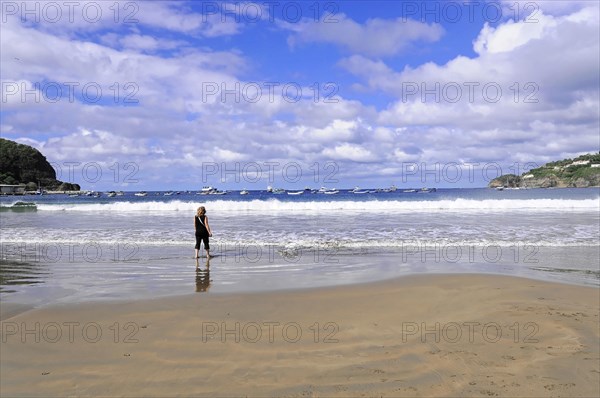 San Juan del Sur, Nicaragua, A person stands on a sandy beach, looking at the sea and the horizon, Central America, Central America