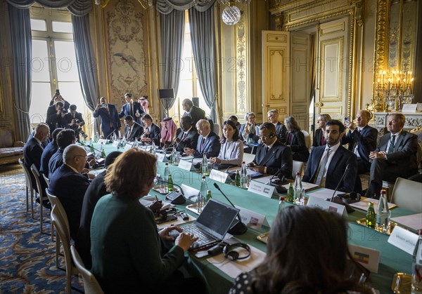 Annalena Baerbock (Alliance 90/The Greens), Federal Foreign Minister, takes photographs as part of her participation in the international humanitarian conference on Sudan and its neighbouring countries. 'Photographed on behalf of the Federal Foreign Office'