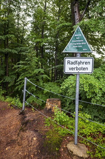 Keeping the environment clean, message to polluters and cyclists on a sign at the upper entrance to the Eistobel, in the nature reserve of the same name near Gruenenbach in Westallgaeu, Bavaria, Germany, Europe