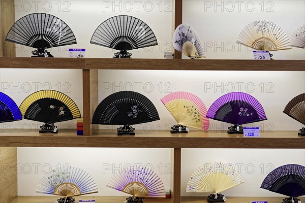 Silk factory Shanghai, Traditional Japanese fans in different colours and patterns on display, Shanghai, China, Asia