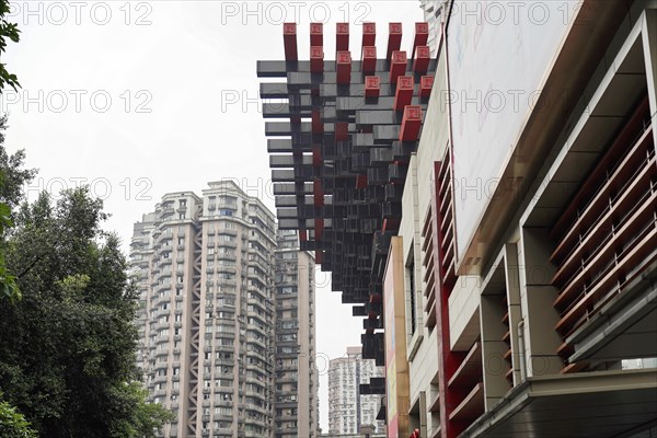 Stroll in Chongqing, Chongqing Province, China, Asia, Modern architecture with striking red elements next to high-rise buildings, Chongqing, Asia