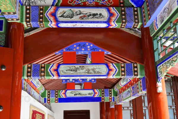 Chongqing, Chongqing Province, China, Asia, Ornamented ceiling with traditional paintings in a Chinese gallery, Asia