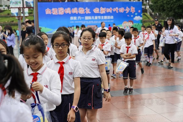 School class in the centre of Chongqing near the museum, the teacher has given his permission for the photo, Chongqing, China, Asia