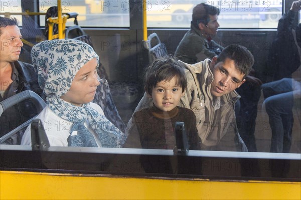 Syrian refugees have arrived at Schoenefeld station on a special train. They are then taken by bus to accommodation in Berlin, 13/09/2015, Schoenefeld, Brandenburg, Germany, Europe