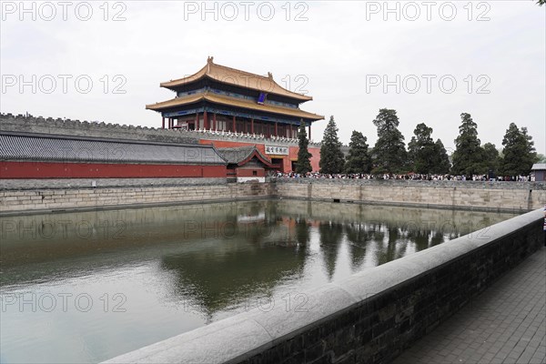 China, Beijing, Forbidden City, UNESCO World Heritage Site, view of a historic building of the Forbidden City with moat in the foreground, Asia