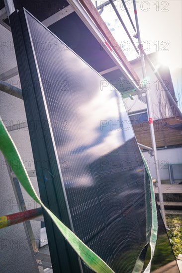 The picture shows a solar panel with the reflection of the sky and clouds, solar systems construction, craft, Muehlacker, Enzkreis, Germany, Europe