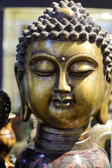 Xian, Shaanxi Province, China, Asia, Close-up of a bronze statue of a Buddha with artistic details, Xian, Shaanxi Province, China, Asia