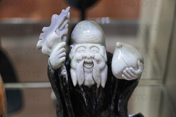 Xian, Shaanxi Province, China, Asia, Figure of an Asian wisdom character, symbolising knowledge and goodness, Xian, Shaanxi Province, China, Asia