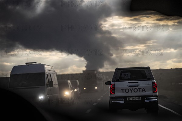 The Federal Minister for Economic Affairs and Climate Protection Robert Habeck (Alliance 90/The Greens) is visiting Poland, Ukraine and the Republic of Moldova from 17.04-19.04.2024. Odessa, 19.04.2024. Drive past the column of smoke in the port of Odessa, where there was a missile strike in the morning