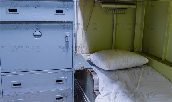 Bunk bed and cabinet in sailor's cabin on board battleship at Unification Park in Gangneung, South Korea, Asia