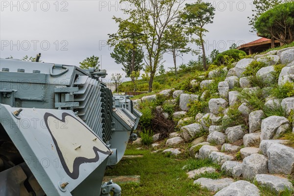 Rear view of military tanks in camouflage paint on display in public park near Nonsan, South Korea, Asia