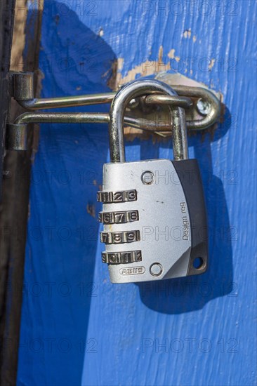 Padlock on a door bolt, Germany, Europe