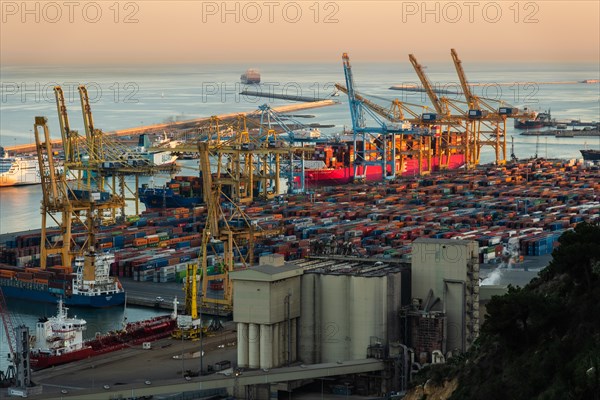 Container harbour in evening light in Barcelona, Spain, Europe