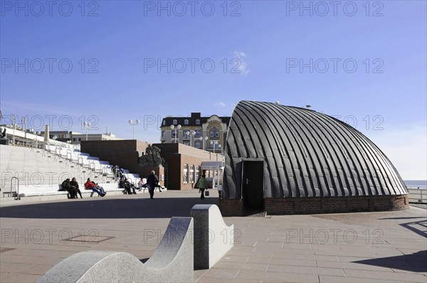 Westerland, Sylt, Schleswig-Holstein, Germany, Europe, Modern beach promenade with domed building and seating on a sunny day, North Frisian Island, Schleswig Holstein, Europe