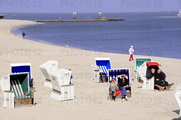 On the beach near Hoernum, Sylt, North Frisian Island, Schleswig-Holstein, people relax in beach chairs and walk along the sandy beach by the sea, Sylt, North Frisian Island, Schleswig-Holstein, Germany, Europe