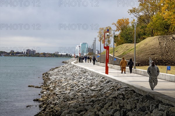 Detroit, Michigan, People walking on the Detroit Riverwalk, on the site of the old Uniroyal tire plant