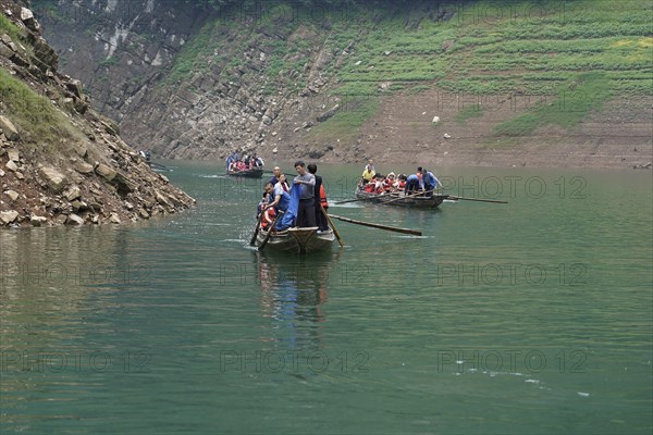 Special boats for the side arms of the Yangtze, for the tourists of the river cruise ships, Yichang, China, Asia, passengers in a boat enjoy a peaceful ride on a quiet river, Hubei Province, Asia