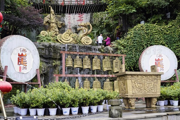 Chongqing, Chongqing Province, China, Asia, Various bells and traditional decorations in an Asian temple area, Asia