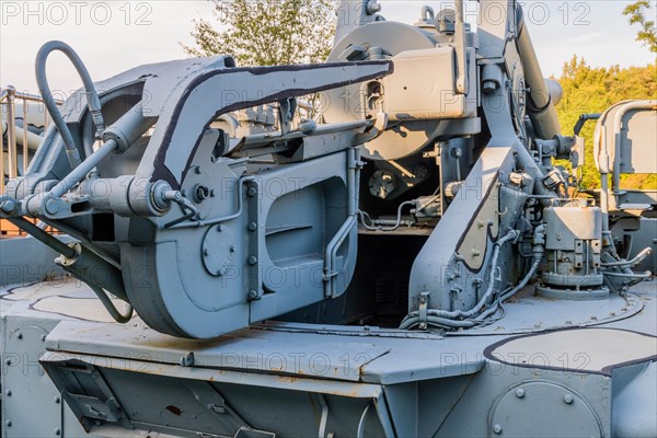 Rear view of camouflaged tank with Closeup view of ammunition loader used to load shells into gun barrel in Nonsan, South Korea, Asia