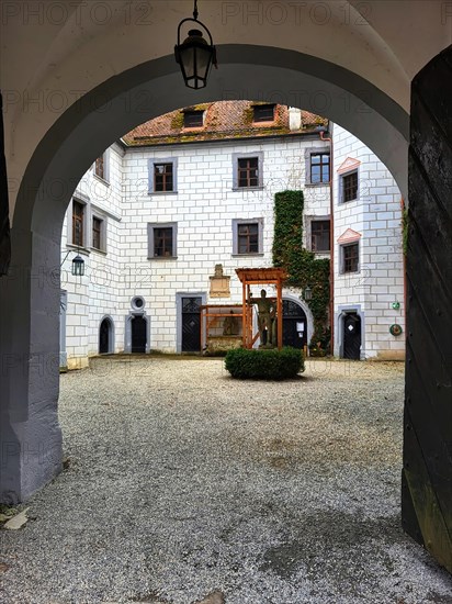 Mitwitz moated castle under a cloudy sky. Mitwitz, Kronach, Upper Franconia, Bavaria, Germany, Europe