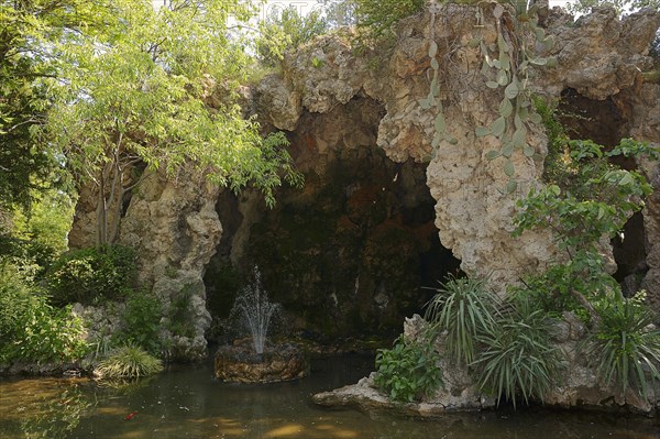 Cave and pond in Le Rocher des Doms park, Avignon, Vaucluse, Provence-Alpes-Cote d'Azur, South of France, France, Europe