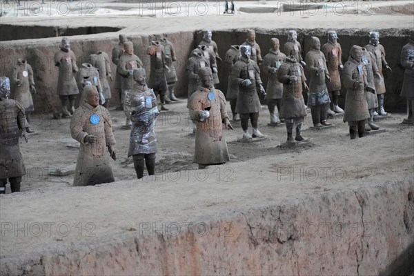 Terracotta army figures, Xian, Shaanxi Province, China, Asia, Terracotta warriors in an archaeological site, captured in natural earth tones, Xian, Shaanxi Province, China, Asia