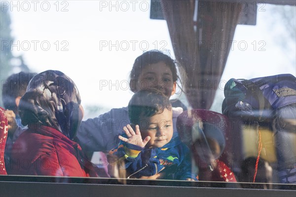 Syrian refugees have arrived at Schoenefeld station on a special train. They are then taken by bus to accommodation in Berlin, 13/09/2015, Schoenefeld, Brandenburg, Germany, Europe