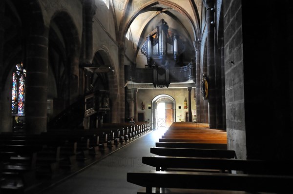 Kaysersberg, Alsace Wine Route, Alsace, Departement Haut-Rhin, France, Europe, View through the interior of a church with pews and organ, Europe