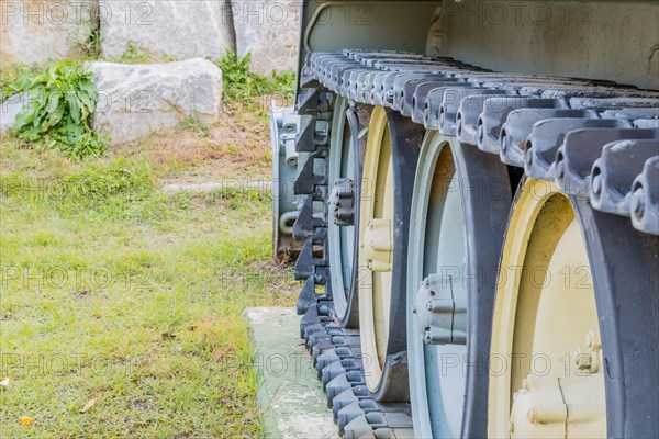 Closeup of wheel assembly and track on a army tank in military history park in Nonsan, South Korea, Asia