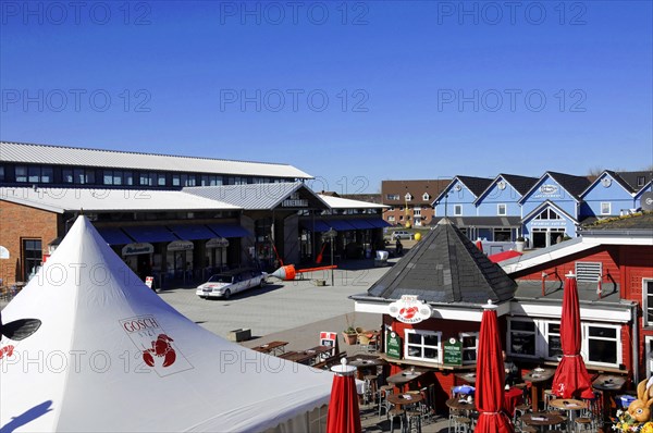 List, harbour, Sylt, North Frisian island, outdoor area of a restaurant with empty tables and chairs under parasols, blue sky panorama, Sylt, Schleswig-Holstein, Germany, Europe