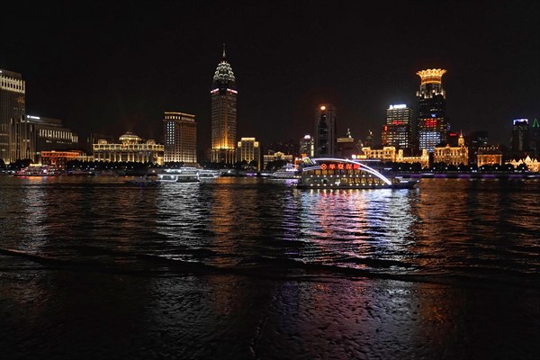 Skyline of Shanghai at night, China, Asia, Colourful city lights reflect in the water during the night, Shanghai, People's Republic of China, Asia