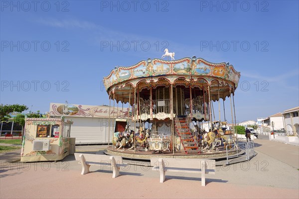 Carousel, Les Saintes-Maries-de-la-Mer, Camargue, Bouches-du-Rhone, Provence-Alpes-Cote d'Azure, South of France, France, Europe