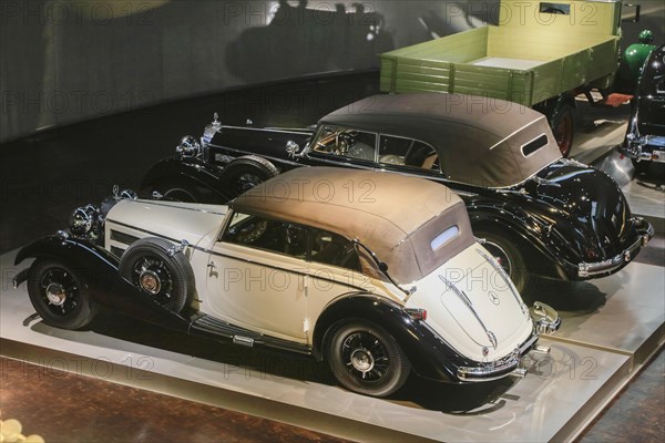 Mercedes-Benz 540 K Cabriolet B and Mercedes-Benz 770 Grand Mercedes open-top touring car, Mercedes-Benz Museum, Stuttgart, Baden-Wuerttemberg, Germany, Europe