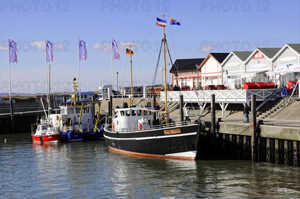 List, harbour, Sylt, North Frisian island, boats moored in a small harbour next to a jetty with several flags flying above, Sylt, Schleswig-Holstein, Germany, Europe