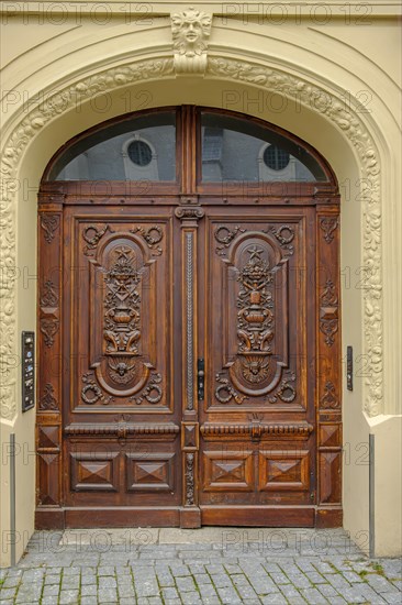 Richly decorated historic front door from 1902 at Herderplatz No. 3 in the old town centre of Weimar, Thuringia, Germany, Europe