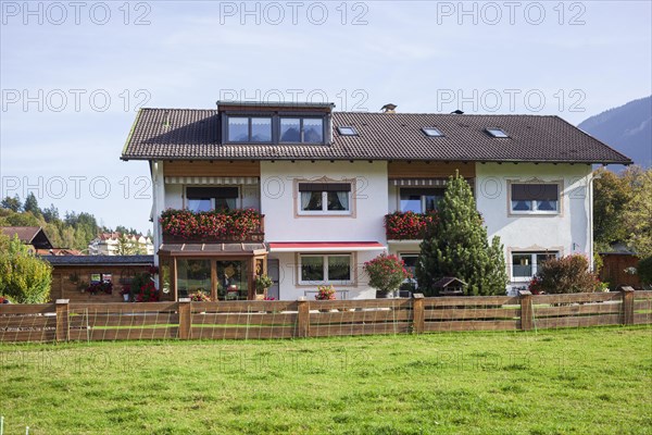 Residential house with holiday flats and pasture, district of Garmisch, Garmisch-Partenkirchen, Werdenfelser Land, Upper Bavaria, Bavaria, Germany, Europe