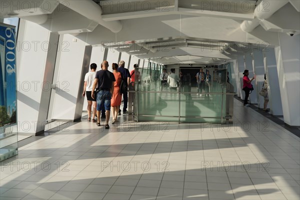 Viewing terrace, The Bottle Opener with 492 metres, Viewing terrace, The Bottle Opener with 492 metres, Passers-by walk through a modern corridor with natural light and a relaxed atmosphere, Shanghai, China, Asia