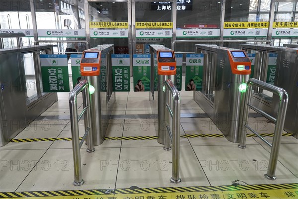 Hongqiao railway station, Shanghai, China, Asia, Access area with turnstiles and ticket readers in a railway station, Yichang, Hubei province, Asia