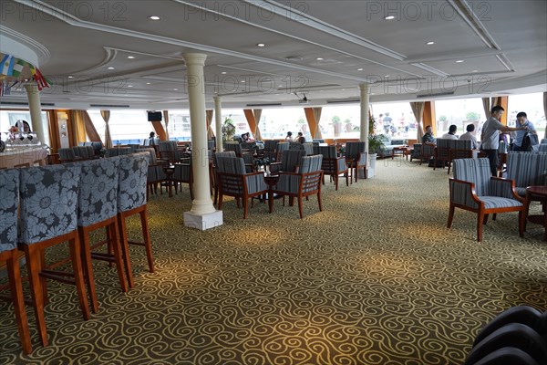 Cruise ship on the Yangtze River, Yichang, Hubei Province, China, Asia, A lounge with comfortable armchairs and bar on a cruise ship overlooking the sea, Shanghai, Asia