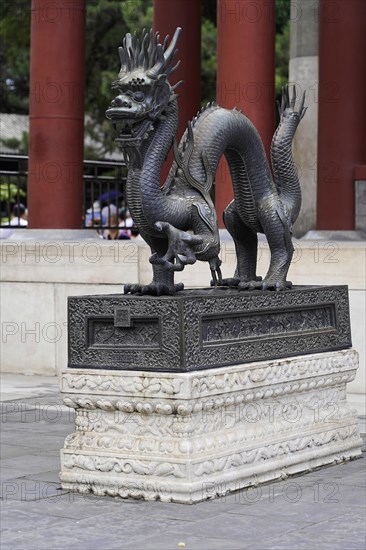 New Summer Palace, Beijing, China, Asia, A detailed bronze dragon sculpture is enthroned on a stone pedestal, Beijing, Asia