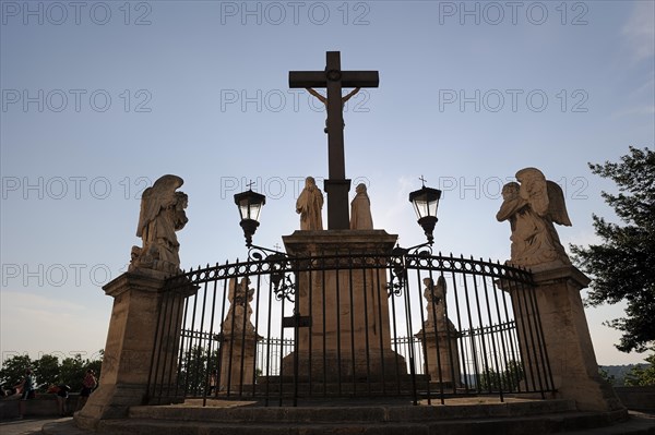 Jesus cross and angel statues, Avignon, Vaucluse, Provence-Alpes-Cote d'Azur, South of France, France, Europe