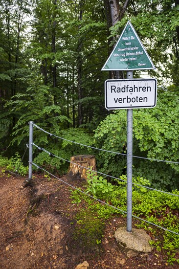 Keeping the environment clean, message to polluters and cyclists on a sign at the upper entrance to the Eistobel, in the nature reserve of the same name near Gruenenbach in Westallgaeu, Bavaria, Germany, Europe