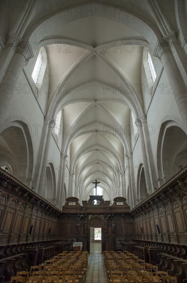 Oak choir stalls, 17th century, and ribbed vault in the former Cistercian monastery of Pontigny, Pontigny Abbey was founded in 1114, Pontigny, Bourgogne, France, Europe