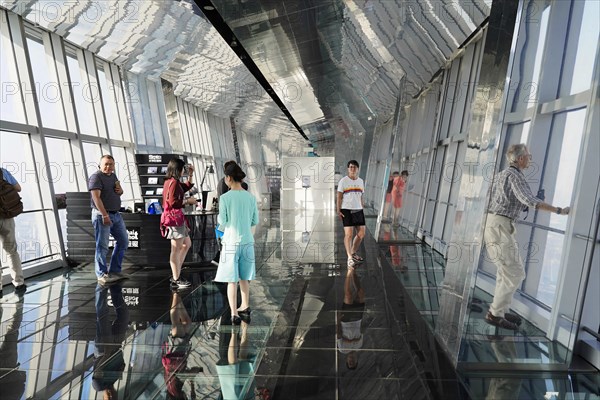 Viewing terrace, The Bottle Opener at 492 metres, people on a viewing platform with glass floor and mirrored ceiling above the city, Shanghai, China, Asia