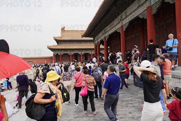 China, Beijing, Forbidden City, UNESCO World Heritage Site, Crowd in front of the impressive backdrop of a Chinese palace, Forbidden City (Palace Museum) in Beijing, China, Asia
