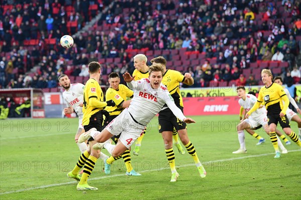 Timo Huebers (#4), 1.FC Koeln in the all-round fight for the ball, 1st Bundesliga, 1.FC Koeln, BVB Borussia Dortmund on 20.01.2024 at the RheinEnergieStadion in Cologne Germany .Photo: Alexander Franz (DFL/DFB REGULATIONS PROHIBIT ANY USE OF PHOTOGRAPHS AS IMAGE SEQUENCES AND/OR QUASI-VIDEO)