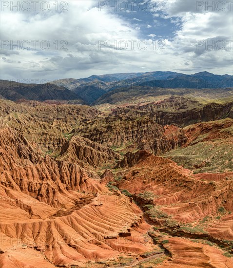 Badlands, gorges and mountains, eroded red sandstone cliffs, Konorchek Canyon, Boom Gorge, aerial view, Kyrgyzstan, Asia