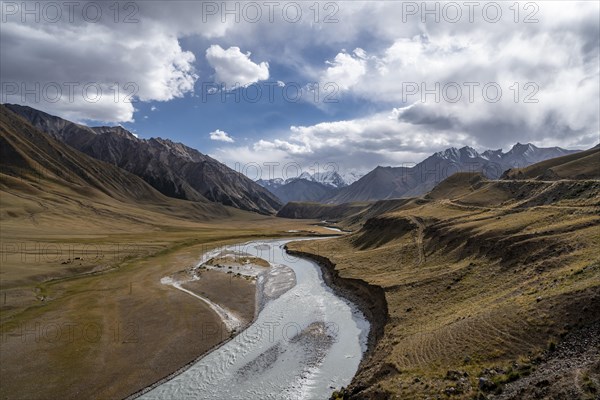 Mountain valley with Sary Jaz river, autumn mountains with yellow grass, Tien Shan, Kyrgyzstan, Asia
