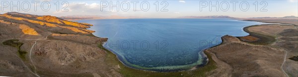 Aerial view, Vast empty landscape at the mountain lake Song Kul, Moldo Too Mountains, Naryn region, Kyrgyzstan, Asia