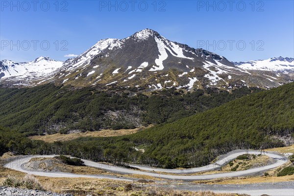 Serpentine road in front of Mount Enap, Routa Y-85, Timaukel, Tierra del Fuego, Magallanes and Chilean Antarctica, Chile, South America